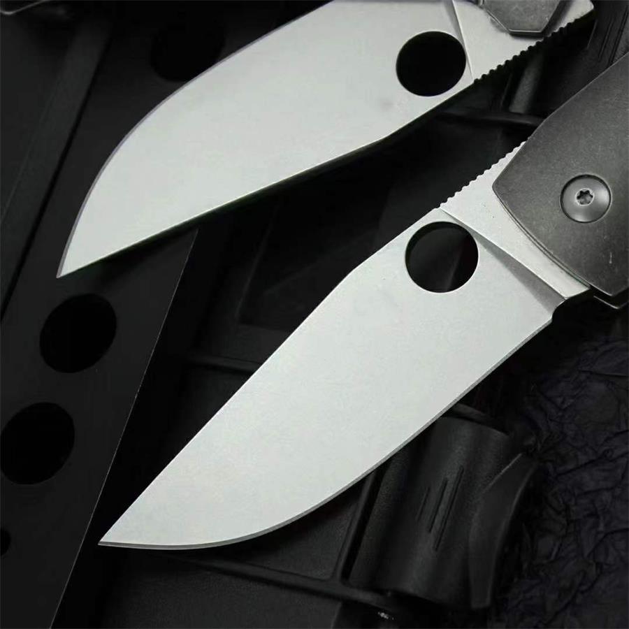 D2 Steel Folding Tool Featuring Titanium Alloy Handle for Outdoor Use