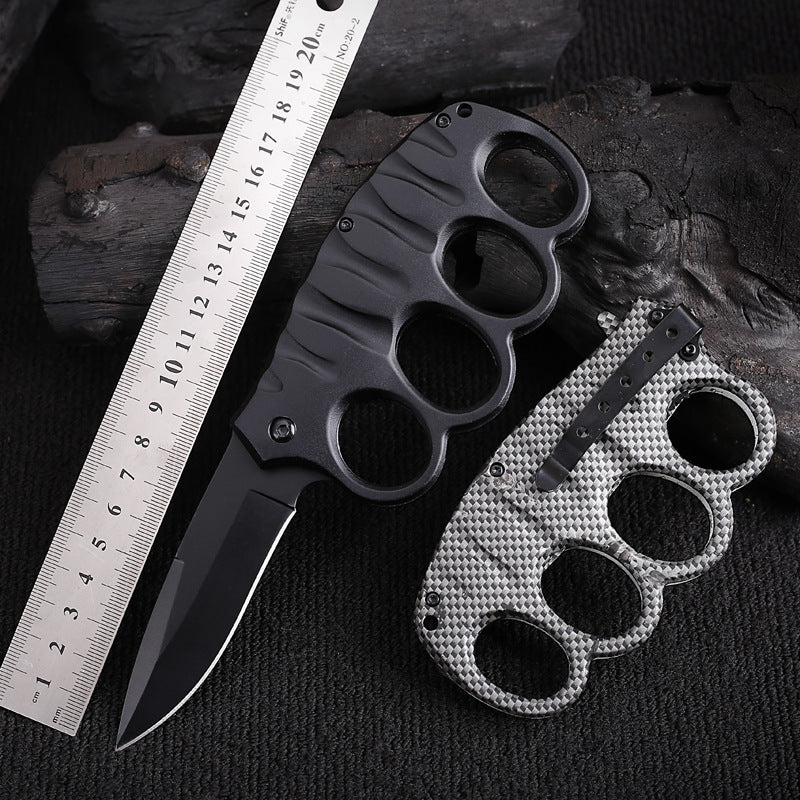 Versatile Four-Hole Outdoor Tool with Black-Plated Titanium and Carbon Fiber