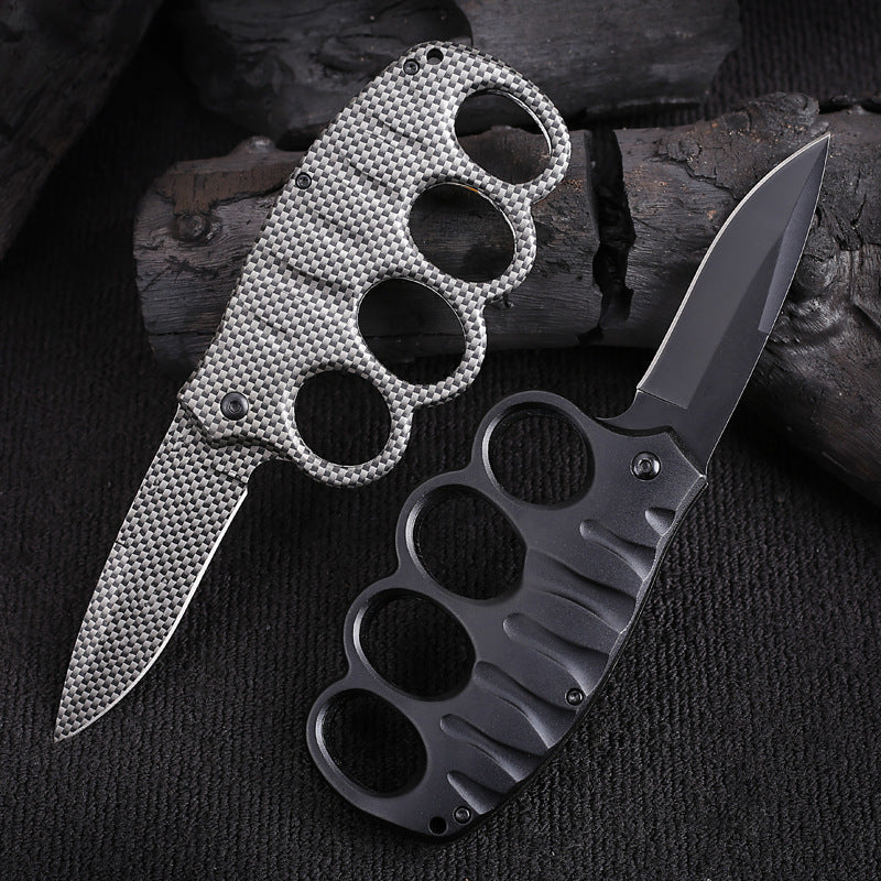 Versatile Four-Hole Outdoor Tool with Black-Plated Titanium and Carbon Fiber