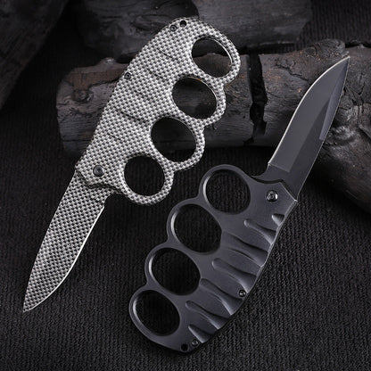 Versatile Four-Hole Outdoor Tool with Black-Plated Titanium and Carbon Fiber