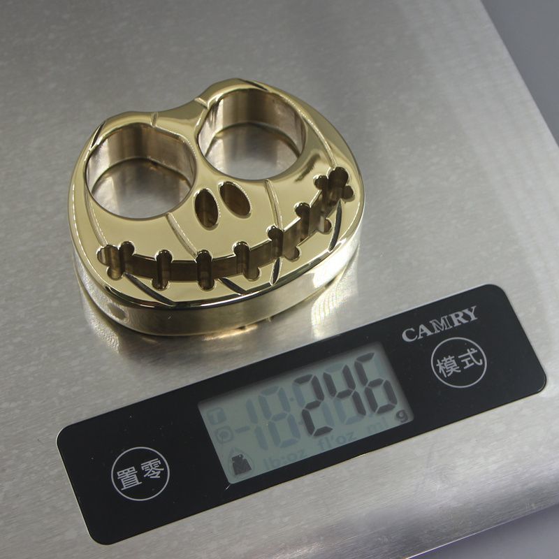 Miniature Brass Outdoor Tool with Pumpkin Design