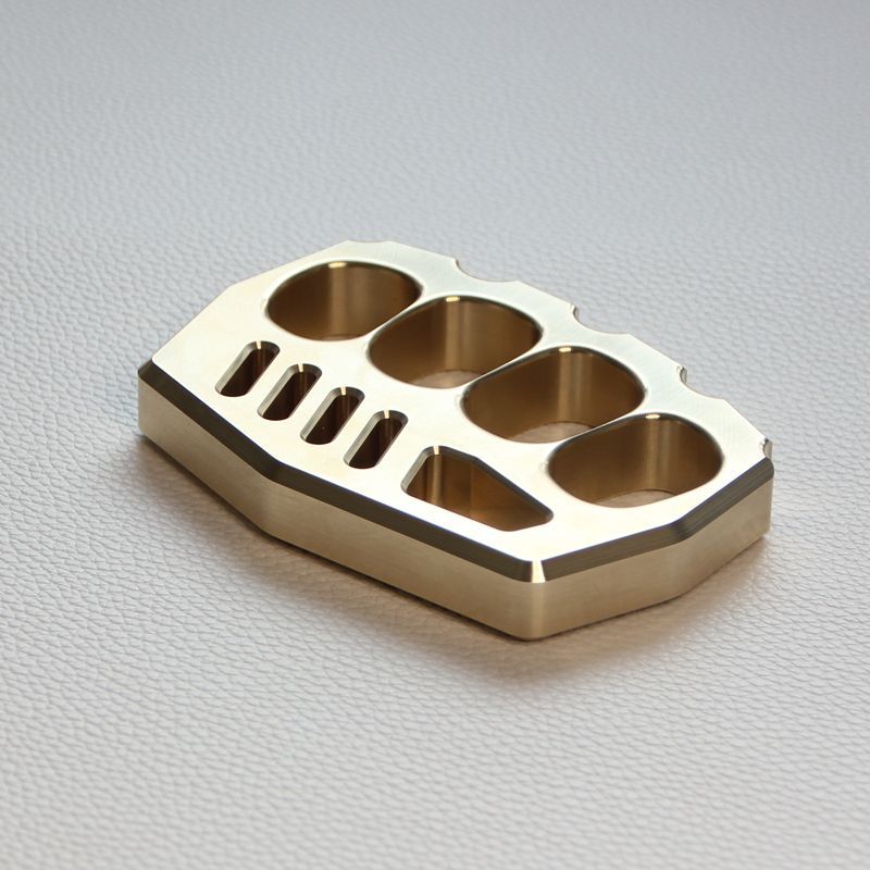 Durable Outdoor Brass Tool with Thick Four-Hole Design