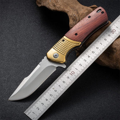 Steel Folding Tool Featuring a Wooden Handle for Outdoor Activities