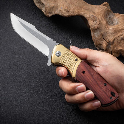 Steel Folding Tool Featuring a Wooden Handle for Outdoor Activities