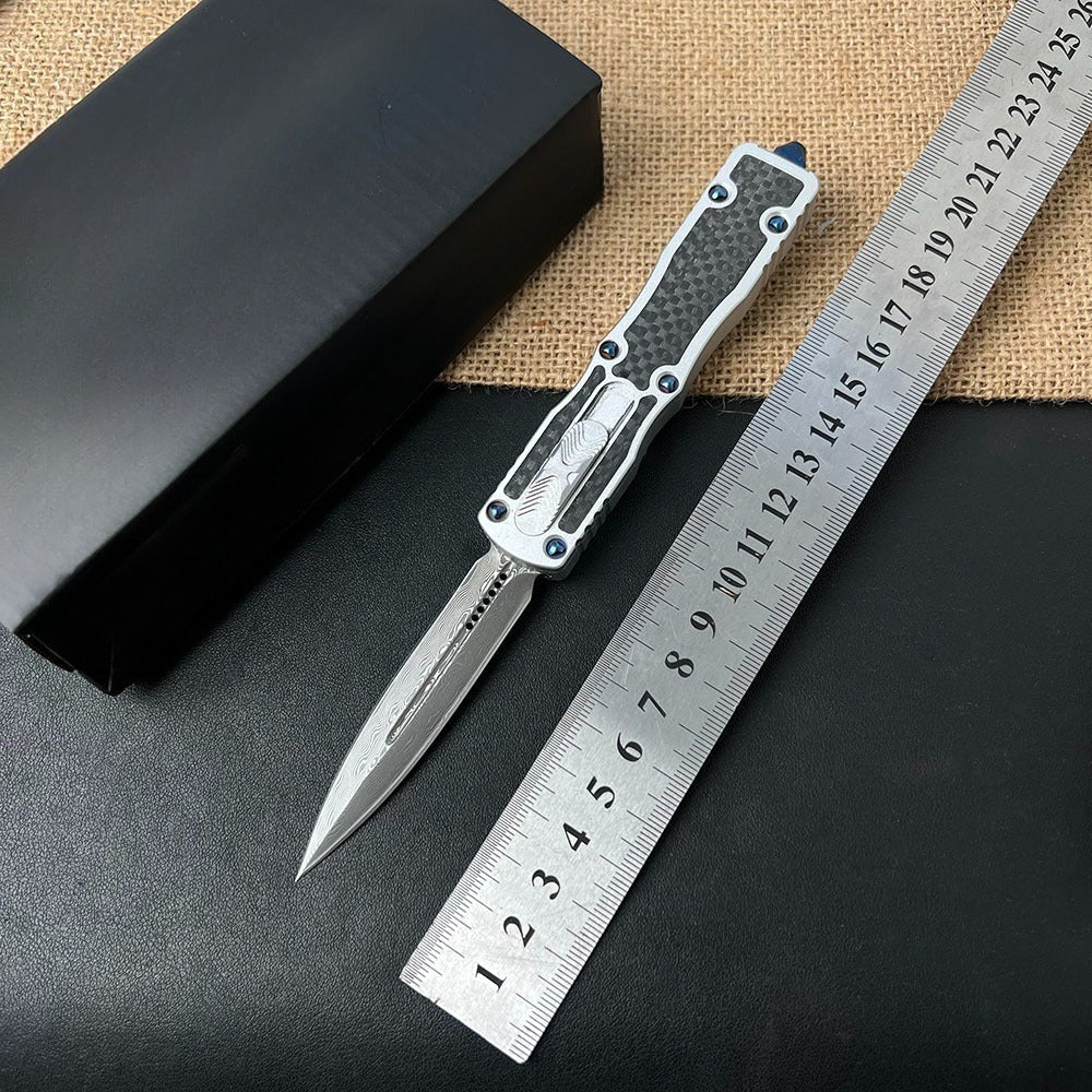 02ac2523e46b388c7e825a3042f8e581 Damascus Carbon Fiber White Handle Aluminum Alloy Outdoor Portable Tool - Image 1