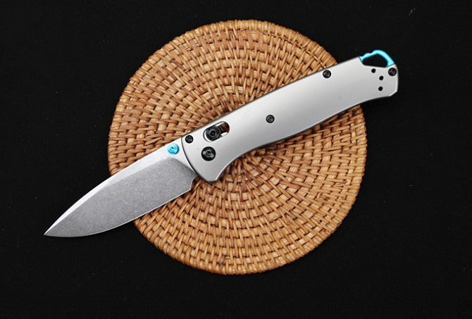 0e6f41c0a8cf3956c9b29a6ae1b131e2 BM535-3 Silver Titanium Handle S90V Outdoor Folding Tool - Image 1