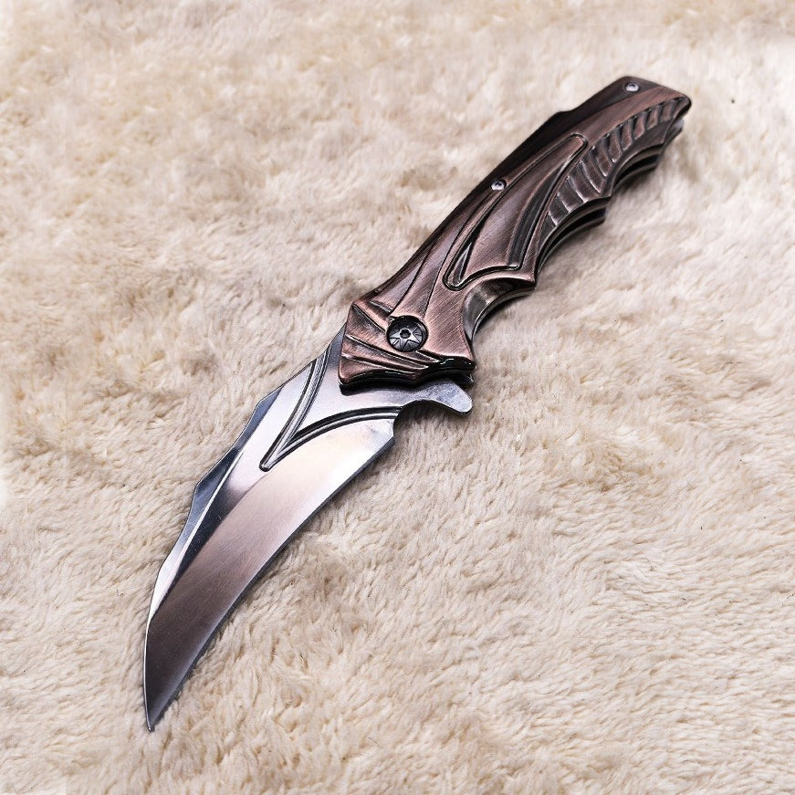 a4c5bd4ec3b65565c40299e136db51a8 DA158 Creative Antique Bronze Handle Folding Outdoor Tool - Image 1