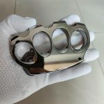 Polished Titanium Knuckle Duster with Sleek Reflective Surface - 图片 6