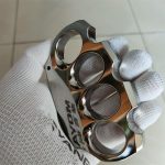 Polished Titanium Knuckle Duster with Sleek Reflective Surface - 图片 2
