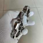 Polished Titanium Knuckle Duster with Sleek Reflective Surface - 图片 7